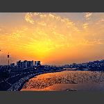 晚霞映庸城