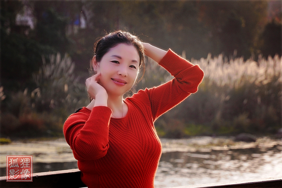 妩