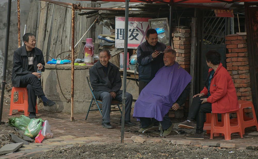 自家门前理发匠