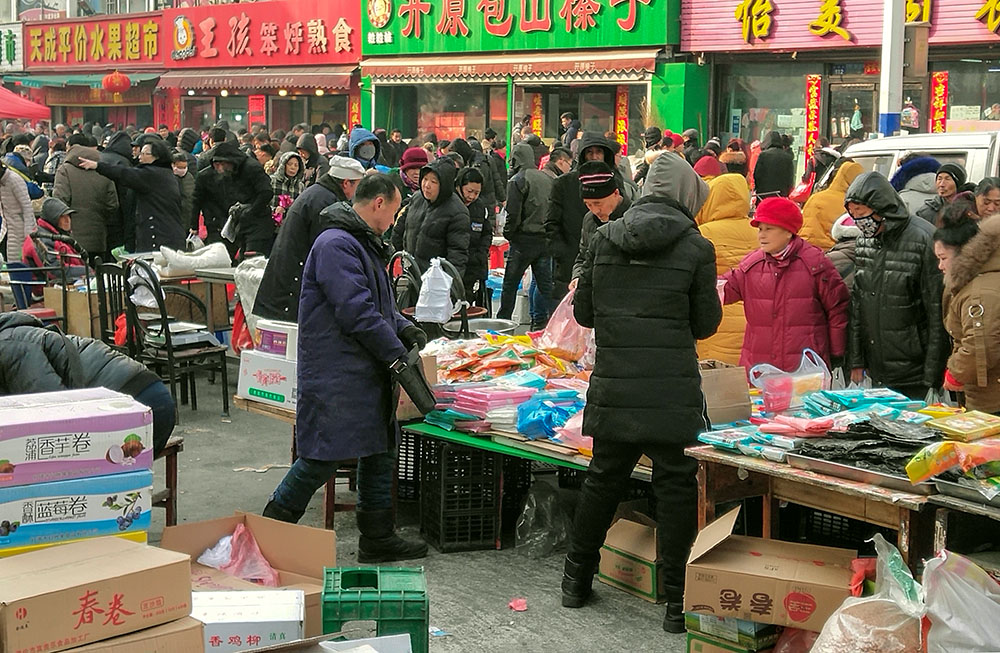 腊月集市手机摄
